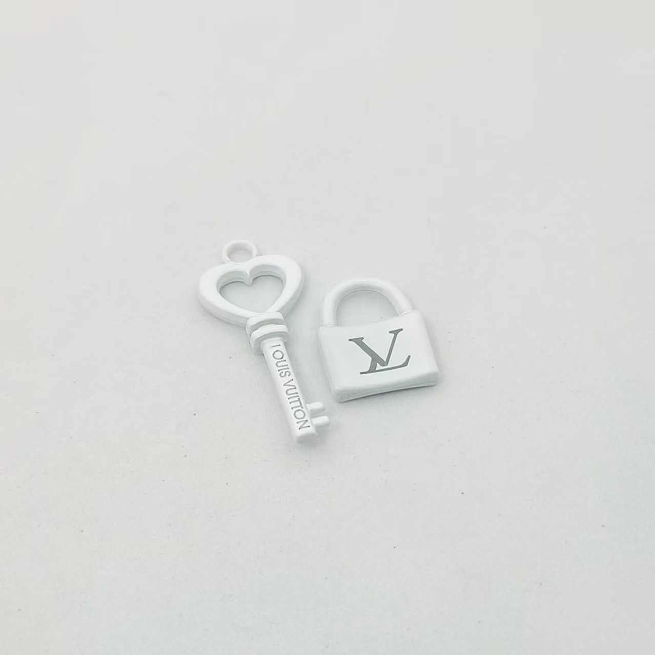 A set of white keys and locks
