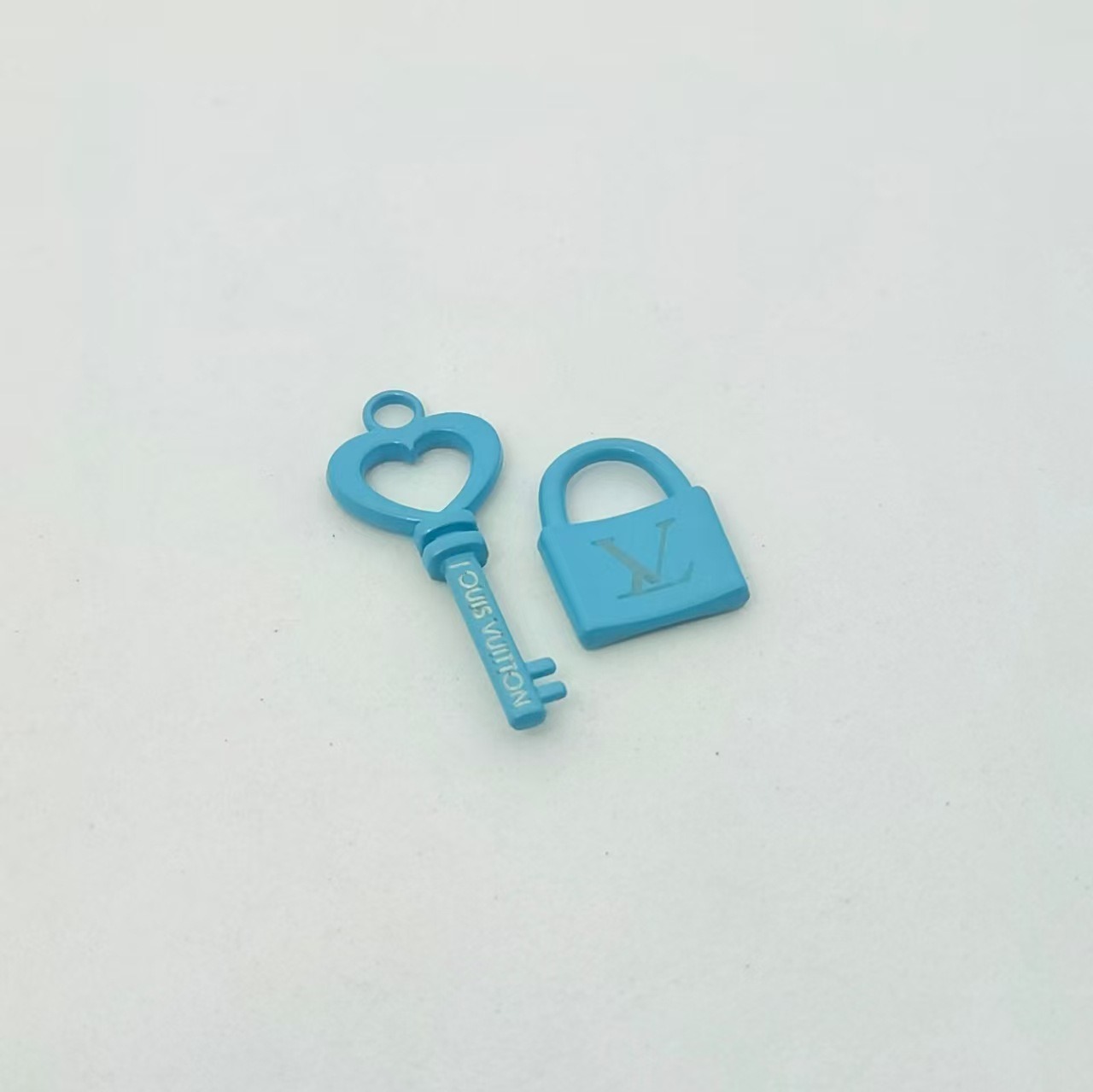 Sky blue set of keys and locks
