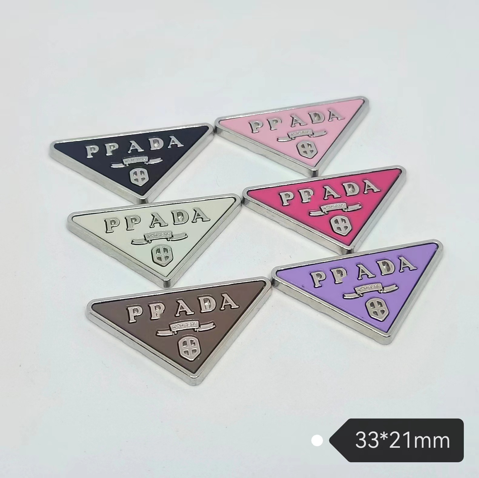 Prada Triangle Metal Double Pair Shoes Clothing Hats Socks Hair Accessories Hair Clips Grippers Cell Phone Case Accessories 33*21MM