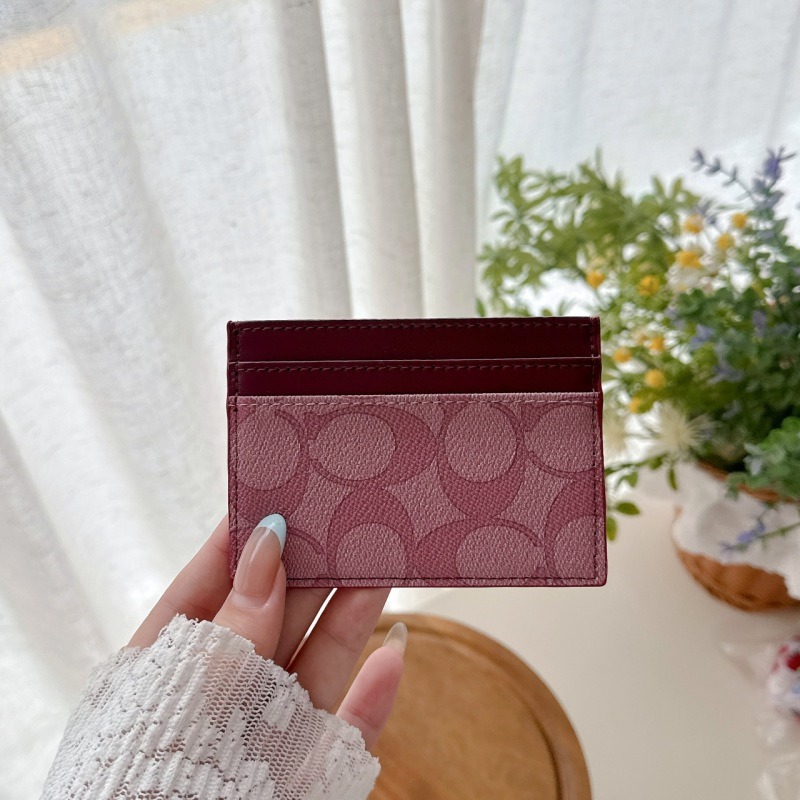 COACH card sleeve