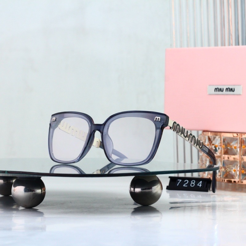 7284 P20232525 Miu Miu Transparent Blue Square Eyeglasses
