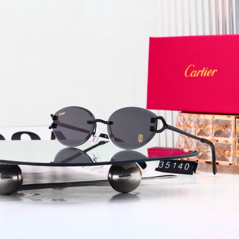 35140 P25232528 Cartier Rimless Oval Sunglasses