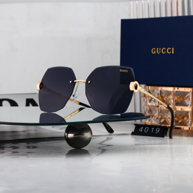 4019 P252328 Gucci Gold‑Tone Rimless Hexagonal Sunglasses